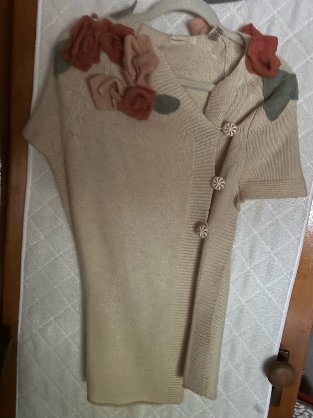 Anthropologie Sleeping on Snow Cream Wrap Top with Floral Appliqué
